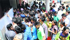 Students rush to see the cut-off list at DAV College in Sector 10, Chandigarh, on Saturday.
