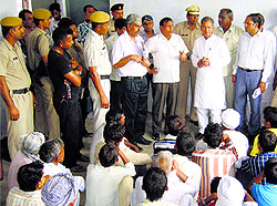 A member of the NCSC talks to Bhagana Dalits at Hisar on Saturday