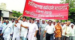 Employees from various government departments march in protest at Rewari on Saturday