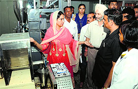 Harsimrat Kaur Badal, Union Minister of Food Processing Industries, inspects a machinery at CIPHET, PAU, in Ludhiana on Saturday.