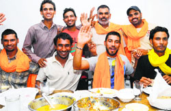 The workers evacuated from Iraq at Punjab Bhawan in Delhi on Saturday. Tribune photo