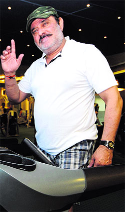 Yograj Singh, father of Yuvraj Singh, exercising at a gym in Chandigarh on Saturday. 