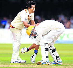 MCCs captain Sachin Tendulkar smiles as Rest of the Worlds Yuvraj Singh bows before him during a cricket match to celebrate 200 years of Lords in London on Saturday. Brief scores: RoW XI: 293/7 (Yuvraj 132; Ajmal 4/45); MCC: 296/3 in 45.5 overs (Finch 181*, Tendulkar 44). 