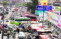A view of unauthorised autos, cycle-rickshaws and vendors selling goods outside the Shaheed Madan Lal Dhingra Inter-state Bus Terminus in Amritsar