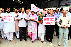  Residents seek a new train between Bathinda to Varanasi at the railway station in Bathinda on Sunday.