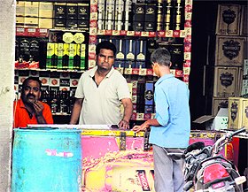 A youth buys liquor from a vend in Bathinda.