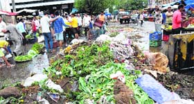 A heap of garbage at the vegetable market in Sector 26.