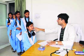 Students of Guru Ram Rai School being examined by a doctor in Dehradun on Saturday