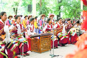 Students of TCV perform at a cultural function to mark the 79th birthday of the Dalai Lama at the Tsugle Khang Temple at McLeodganj in Dharamsala on Sunday.