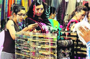 Sunday is Shopping Day: Jalandhar residents busy shopping at an exhibition in Jalandhar on Sunday. 