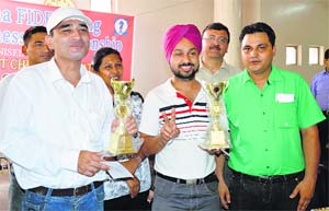 Manoj Kumar, the winner, and Amarjit Singh, who finished runner-up, during the FIDE Rating (below 1800) Prize Money Chess Championship in Ludhiana.