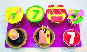 Cup cakes on the theme football at a bakery in Ludhiana.