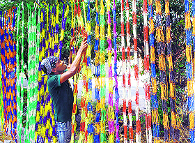 A vendor displays handmade hammocks alongside a road in Amritsar