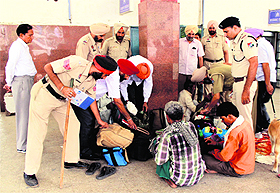  Police personnel increase checking at the Bathinda Railway Station on Sunday.