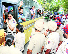 The protesting Congress workers who were taken into preventive custody ahead of the Chief Minister's visit, in Sangrur on Sunday.