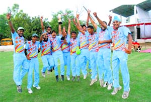 Sachin XI team rejoices after winning the BPL trophy on Monday.