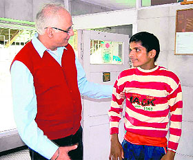 Dr Sunil Sanon examines a patient in Mussoorie.