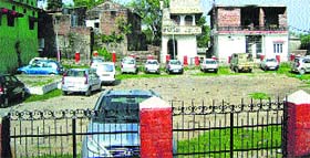Vehicles parked in a playground in ward number two of Nurpur. Photo by writer