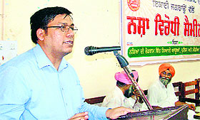 Rajesh Bagha, chairman, Punjab State Commission for Scheduled Castes, addresses students during a seminar in Jagraon on Monday.