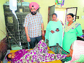 Doctors attend to a patient at Sehora village near Payal.