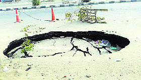 A portion of the Chandigarh road that caved in due to illegal digging.