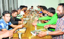 Punjabi youths at Punjab Bhawan in New Delhi after their arrival from Iraq on Monday. 
