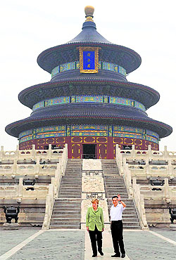 German Chancellor Angela Merkel  (L) and Chinese Premier Li Keqiang visit the Temple of Heaven in Beijing on Monday. Merkel is on a three-day visit to China.