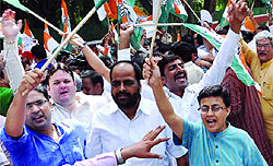 Congress activists shouting slogans during a protest against the Rail Budget in New Delhi on Tuesday