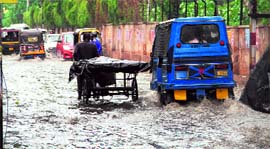 A waterlogged road following a heavy downpour in Dehradun on Tuesday.
