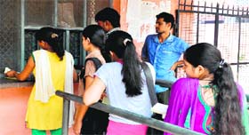 Students line up at the admission counter of Shravan Nath Math Jawaharlal Nehru College in Haridwar on Tuesday.