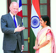 External Affairs Minister Sushma Swaraj with British Foreign Secretary William Hague in New Delhi on Tuesday.
