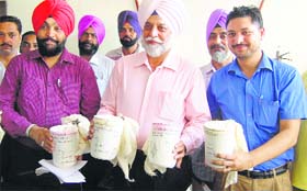 State Special Operation Cell officials with the seized heroin in Amritsar on Tuesday.