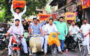 Members of the ABVP take out a motorcycle rally to celebrate its foundation day in Bathinda on Wednesday. 
