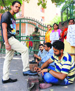 Inclusive education resource teachers polish shoes at Phase VIII in Mohali on Wednesday. Tribune photo: Vicky Gharu