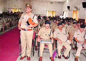 Police officers take part in a meeting at the Police Lines in Dehradun on Wednesday.