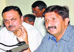 Mukesh Agnihotri, Industries Minister, addresses a press conference in Shimla on Tuesday