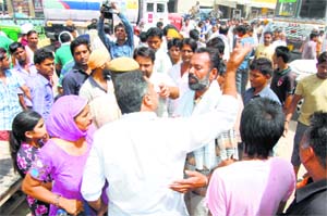 Residents of Ther Mohalla stage a protest at Rania road in Sirsa on Tuesday.