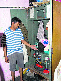 A man shows his ransacked house at Rishi Nagar in Jalandhar on Wednesday.