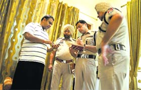 Police officials record the statement of a relative of the kidnapped boy in Ludhiana