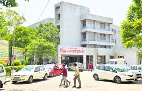 Visitors avoid passing the mortuary at the Civil Hospital (left) in Ludhiana