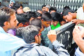 Students jostle to have a look at the cut-off list for BCom first year admissions at Kamla Lohtia Sanatan Dharam College, Ludhiana