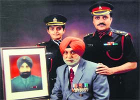 Four generations: Lt Gursheen Dhillon (left) with her father and grandfather (great grandfather in the picture)