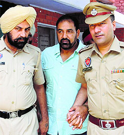 Jagdish Bhola appears at the district court in Mohali on Wednesday