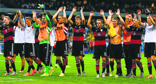 Germans celebrate their incredible victory over Brazil in Belo Horizonte on Tuesday night.