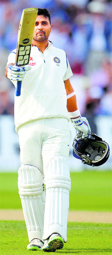 Murali Vijay celebrates his century during the first Test against England in Nottingham on Wednesday.