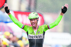 Belkin team rider Lars Boom of the Netherlands celebrates as he wins the fifth stage of the Tour de France on Wednesday.