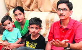 Sushil, an IT professional, with his family at their residence in Sector 7, Chandigarh, on Thursday.