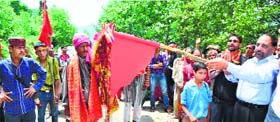 District Development Commissioner Mubarak Singh flags off the Chandi Mata yatra in Doda on Thursday.