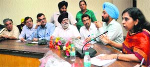 Secretary, Science, Technology and Environment, Seema Jain, Chairman, Punjab Pollution Control Board, Ravinder Singh, and engineers interact with industrialists in Jalandhar on Thursday