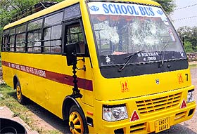 The front windshield of a school bus broken by unidentified persons at Sector 68 in Mohali on Thursday night.